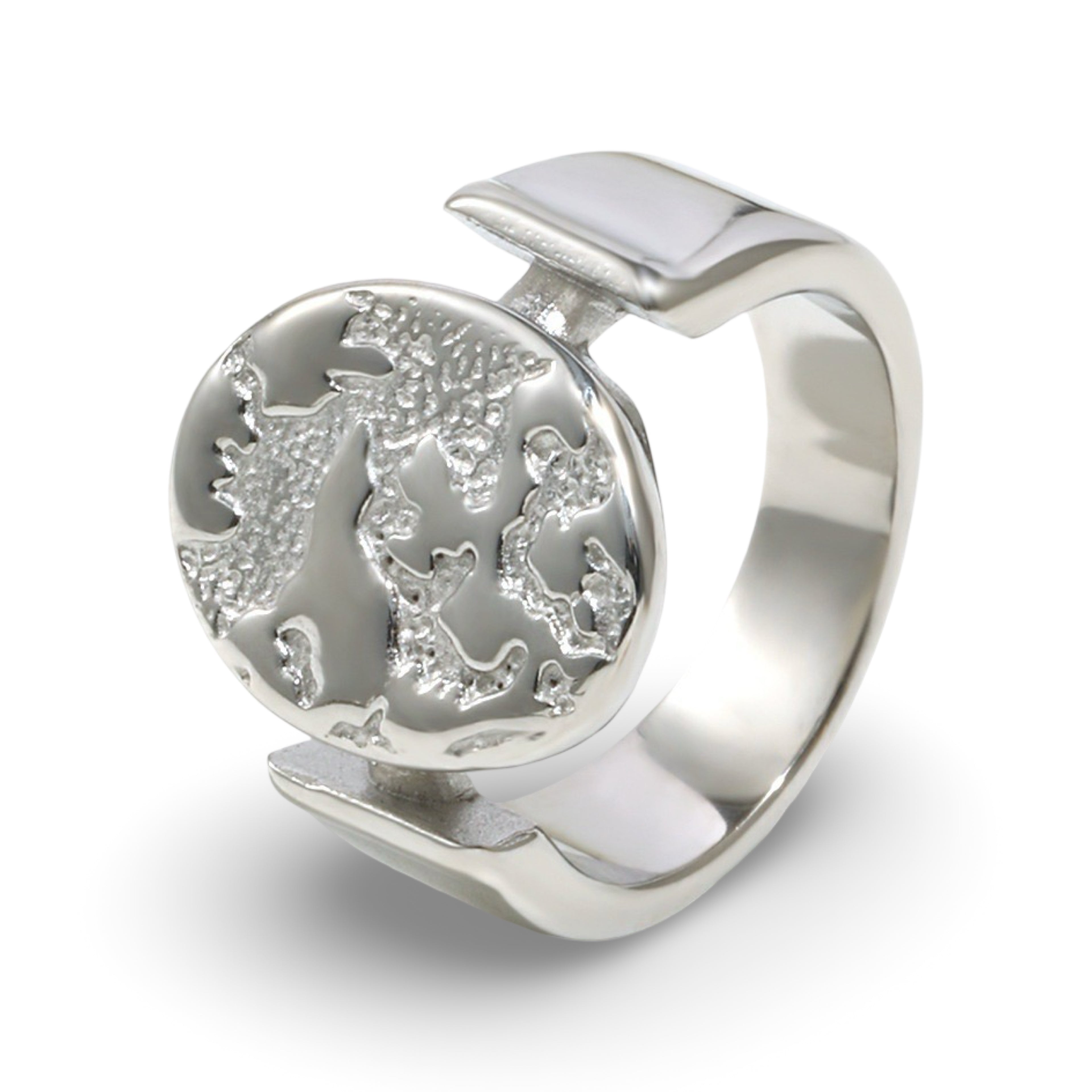 A textured oval ring featuring a raised relief design with an embossed tree motif.